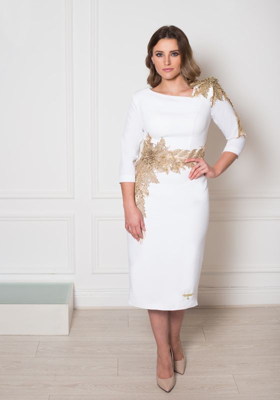 Ivory pencil dress with gold lace detailing and asymmetric neckline