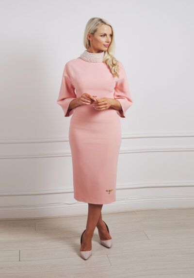 Peach pencil two-piece with high pearl collar and wide sleeves