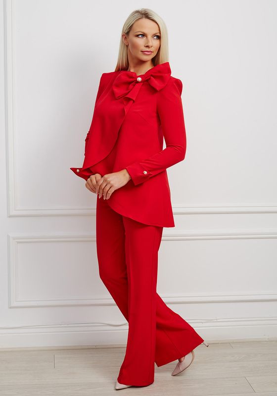 Red suit with oversized bow and pearl detailing with flare trousers
