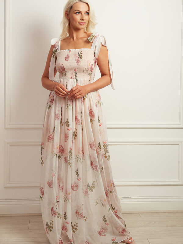 White printed chiffon maxi dress with tie shoulder straps and a shirred bodice