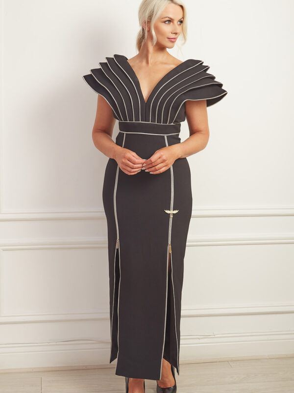 Black column gown with dramatic shoulders and silver zip detailing